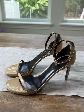 Saint Laurent Beige Patent Leather Ankle-Strap Stiletto Heels has discoloration